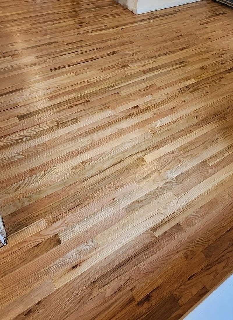 Refinished hardwood great room built by Frederick Flooring & Refinishing